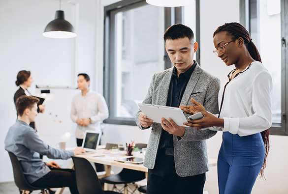 Group of professionals collaborating in a modern office.