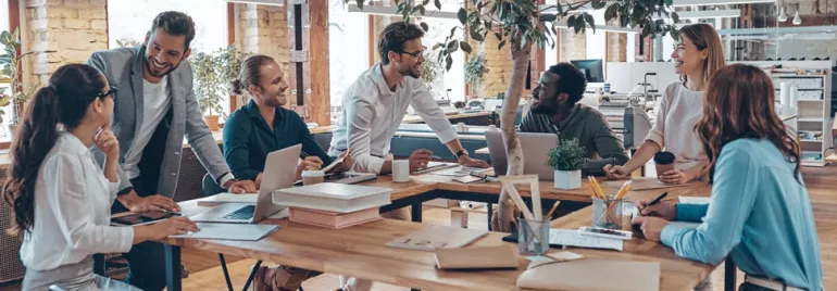 Group of people having a meeting in a modern office space.